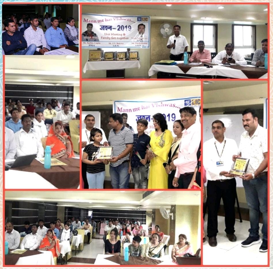 car interior from central back seat position showing driver and blurred view through windscreen of a busy road at night